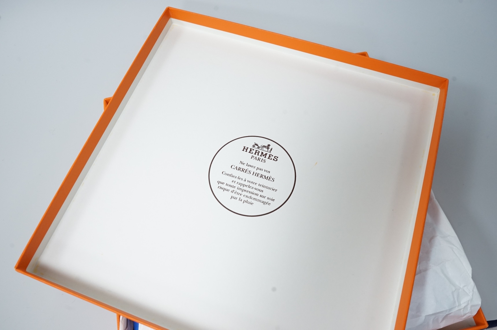 Two boxed Hermes silk scarves comprising ‘Real Escuela Andaluza del Arte Equestre’ and ‘Equateur’, with original boxes, together with four Hermes gentleman’s silk ties